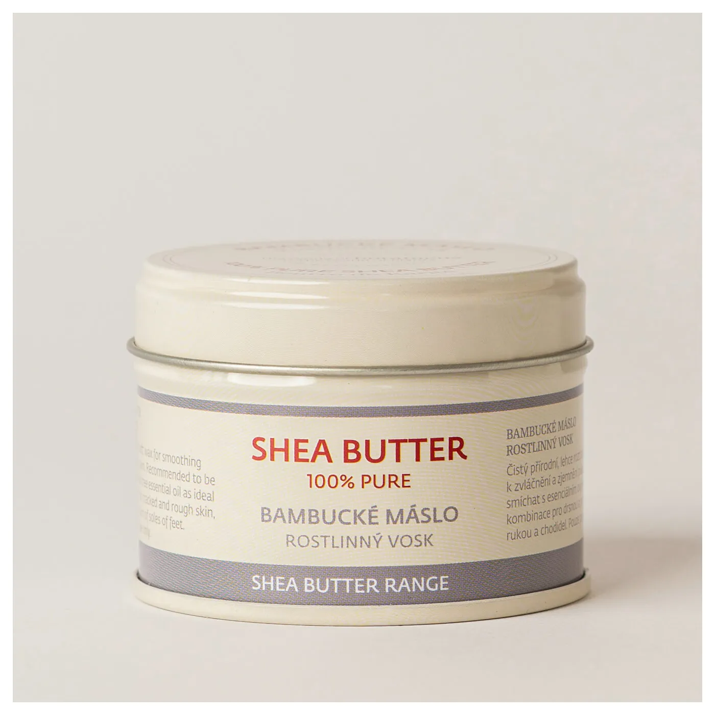 Recipient cu unt de shea pentru vergeturi, recipient alb cu etichetă „SHEA BUTTER” - 100% PURE, în nuanțe albastre.